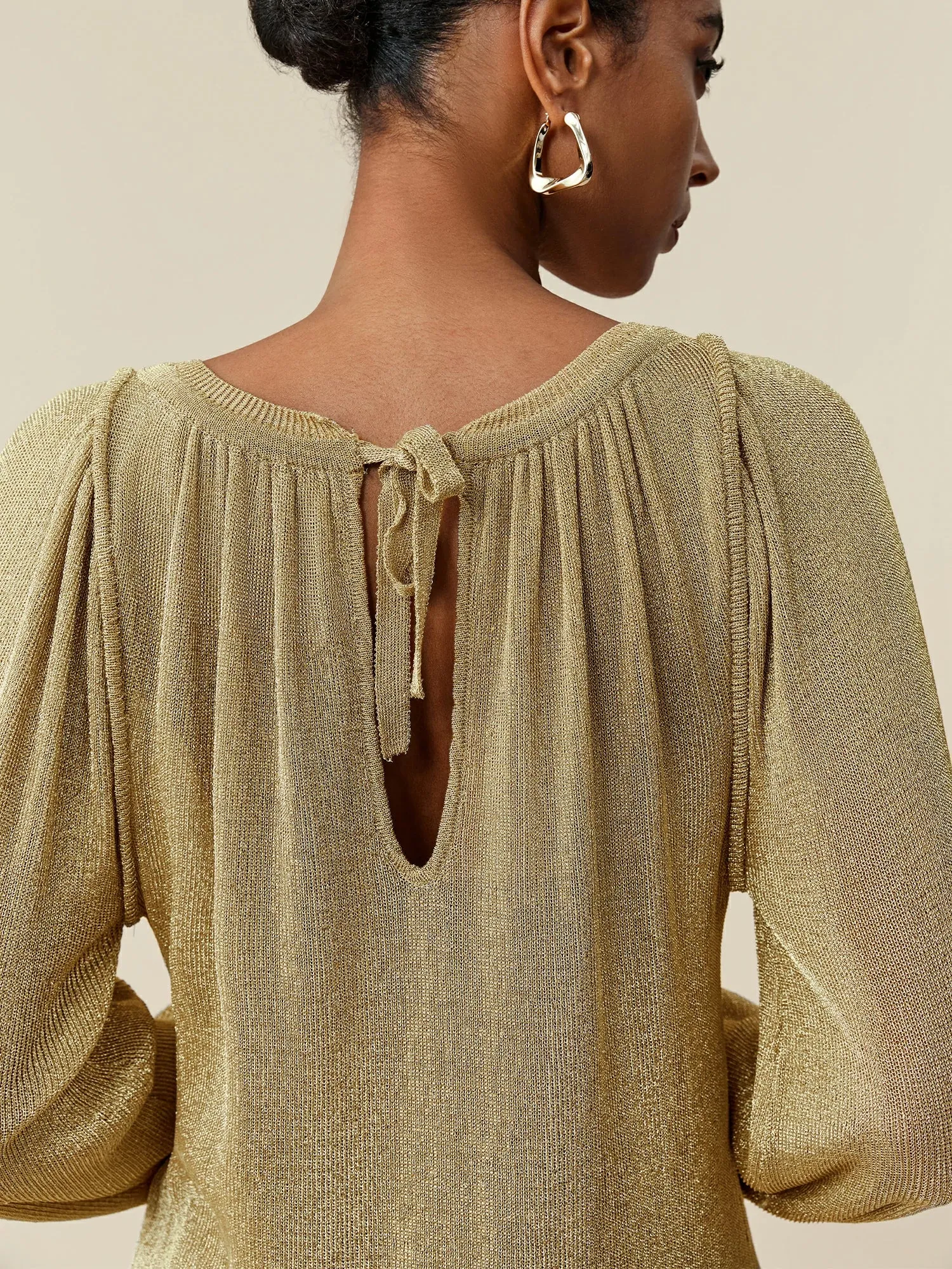Amoretu Round Neck Long Sleeve Drawstring Glitter Top